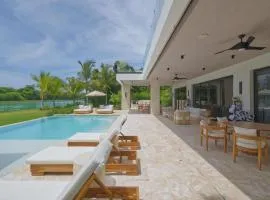 Modern lake villa with staff in golf n beach resort