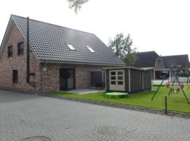 6 Personen Ferienhaus mit Sauna, Whirlpool, zwei Duschen sowie Kaminofen in Otterndorf, ξενοδοχείο σε Otterndorf