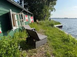 The Historical Trick Hut in the middle of the Lake