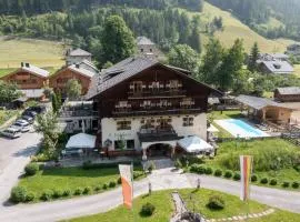 Schlosswirt Chalets & Apartments