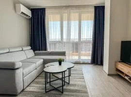1BR Apartment with Panoramic View Balcony and Designated Parking Space