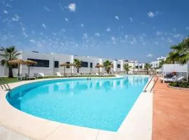 Modern 4-Bedroom Townhouse in Cala Serena Village Walk to the Beach Golf
