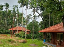 Nature Spot Cottages Coorg, hotel v destinaci Kurchi