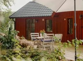 Quaint Barn Nestled Between Sea And Forest
