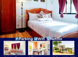 Retreat to a Stylish Flat w/ Balcony + Garden View