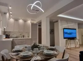 Apartament Zamkowa Park plus garaż podziemny oraz widok na Zamek krzyzacki z XIV wieku , ogród, rzekę i kanał węgorzewski