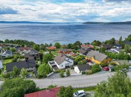 Appartment with garden, hotel com banheiras de hidromassagem em Malvik