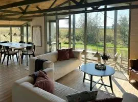 Summer House With Fields And Fjord Views