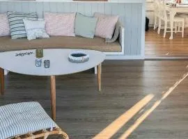 Black Wooden Holiday Home With Sea Views