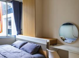 Soft bed,2TVs,many resto shops, acomoda&ccedil;&atilde;o com cozinha em Udon Thani