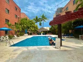 Depa en torre con alberca al lado de la playa - Zona Dorada