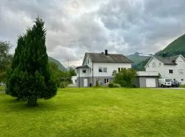 Spacious holiday home by the fjord and mountains