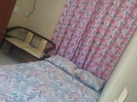 Quarto em casa compartilhada, alojamento com cozinha em Manaus