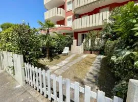 Sunny family apartment with pool near the beach