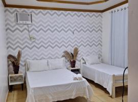 Quarto triplo com banheiro em Pousada e Restaurante, svečių namai Manause