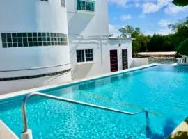 TRANQUIL Sea View Studio with Balcony, Infinity POOL, Overwater Deck & Kitchenette, 2nd Floor