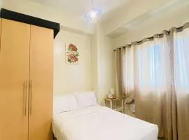 Cozy Iloilo City Condo Room with Shared Pool