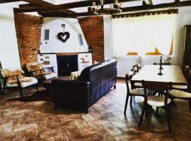 Cerdacul din livada - Șura Bunicilor, villa en Vaideeni