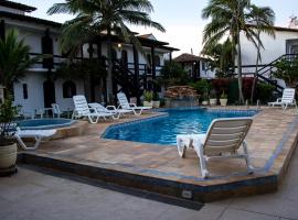 Viesnīca Atlântico Hotel pilsētā Riu das Ostrasa, netālu no apskates objekta pludmale Costa Azul