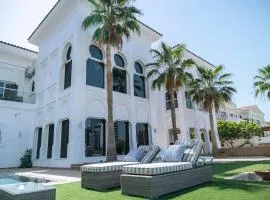 Luxury Palm Villa with direct private beach access