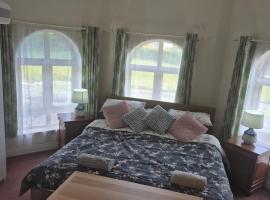 Glenbarrow Lodge, horsk&aacute; chata v destin&aacute;cii Rosenallis