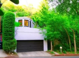 Enchanting Gated Hollywood Hills Oasis with Tranquil Treet-Top Views, Outdoor Living Room and Patios, Magical Zen Garden, Plus Bonus Romantic Guest House and Free Garage in LA's Most Desirable Central Serene Area, Sleeps 8-10