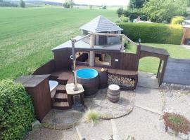 Best Tipi in Morayshire with Whisky Barrel Hot Tub, hotel di Coltfield