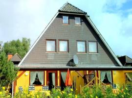 6 Personen Ferienhaus mit 4 Schlafzimmern auf drei Etagen mit Blick auf den Weltschiffahrtsweg in Otterndorf, Hotel in Otterndorf