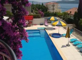 Beachfront Villa Pinky &Superior heated pool and jakuzzi