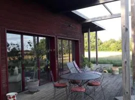 Maison bois à la campagne