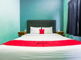RedDoorz at Sentosa Jaya Helvetia, hotell sihtkohas Pulauberayan