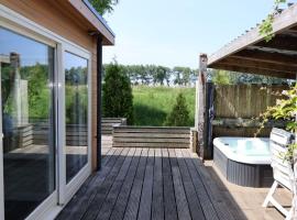 Chalet 30 met jacuzzi, hôtel à Sint-Annaland