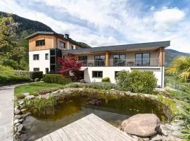 Felsenegg appartements - moderne Wohnungen im Luftkurort mit traumhaftem Garten Nähe Meran für Paare und Familien