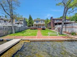 Lakefront home with kayaks fire pit hot tub and walk to restaurants and bars