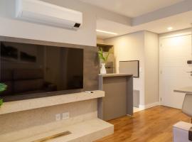 Apartamento elegante próximo a PUC e HSL, hotel in Porto Alegre