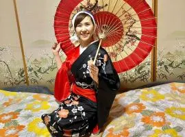 津軽三味線と民謡 ゲストハウス繭子の宿