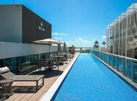 Luxo e conforto no coração de tudo ao lado do mar