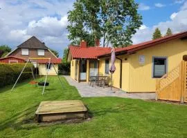 Kinderfreundliches 6 Personen Ferienhaus mit zwei Duschen und Toiletten, Sauna, Whirlpool und einem Wintergarten mit Kaminofen in Otterndorf