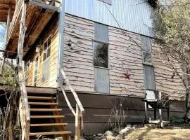 Two-Story Cabin Rental for Large Groups along Hamilton Creek in Marble Falls, Texas
