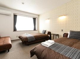 White Tree Lodge Madarao Tangram, Hotel in Shinano