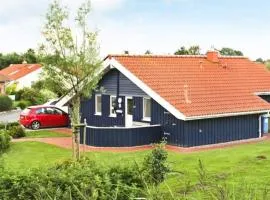 6 Personen Ferienhaus in direkter Seelage mit Bootsteg und Kanu sowie Sauna, Whirlpool und Kaminofen in Otterndorf
