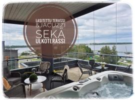 TAMPERE PENTHOUSE-tasokas moderni kaupunki huoneisto huipulla -ISO JACUZZI omalla KATTOTERASSILLA - AURINKOTUOLIT ja Aurinko odottaa Sinua - huikea maisema- - 10 HLÖ - free parking, hotel a Tampere