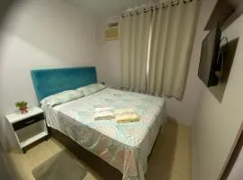 Quarto aconchegante com banheiro