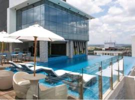 Gorgeous 1BR in One Euphoria, hotel s parkováním v destinaci Angeles