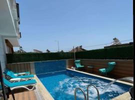 Villa Aile, hotel v destinaci Eskiömerler