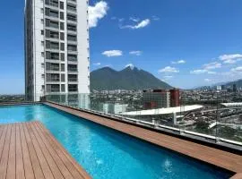 Elegante loft apartment Paseo Santa Lucia king size bed, alberca, gym, parking, kids club