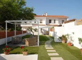 Residenza estiva con giardino vista mare Santa Lucia IUN T7288