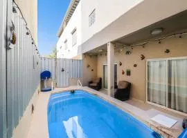 3 Story Home 3BR 2BA with Pool Garage and Rooftop View