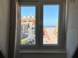 Beachfront studio with sunset view