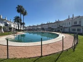 Adosado con piscina cerca de la playa